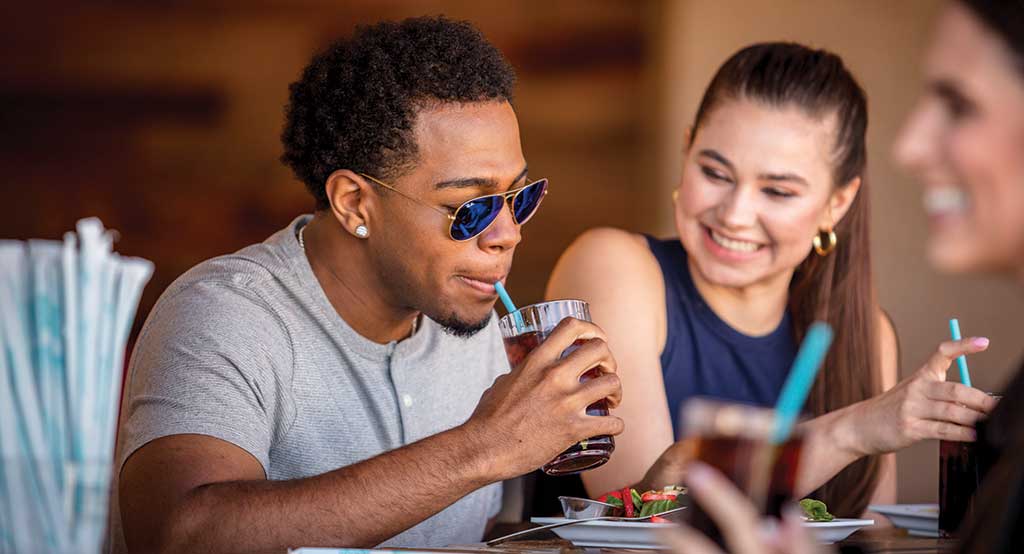 Man drinking from phade straw